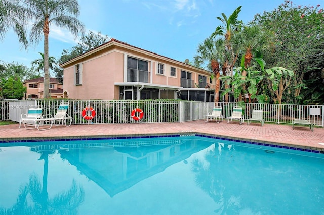 9715 NW 23rd Ct, Pembroke Pines, FL 33024 - community pool featuring a patio