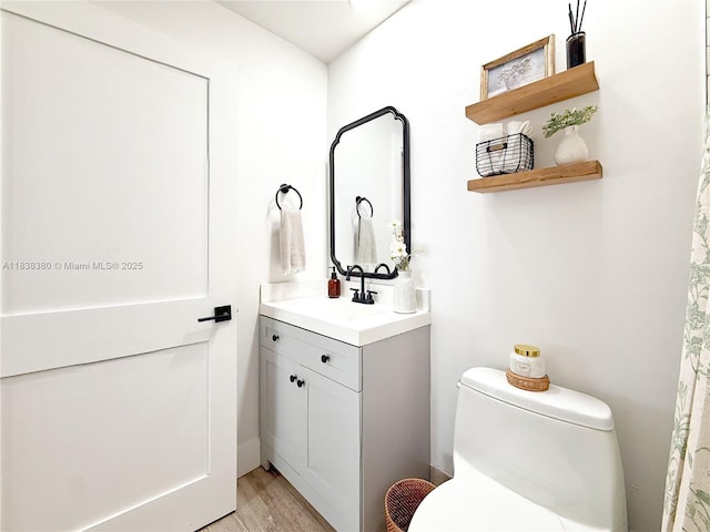 13790 SW 147th Cir Ln Unit 2-9, Miami, FL 33186 - bathroom with vanity and wood finished floors