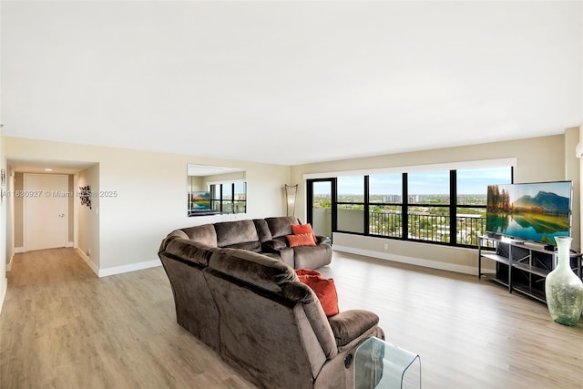 3200 N Port Royale Dr N Unit 1612, Fort Lauderdale, FL 33308 - living room with light wood-style floors and baseboards
