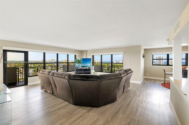 3200 N Port Royale Dr N Unit 1612, Fort Lauderdale, FL 33308 - living area with light wood-type flooring and plenty of natural light