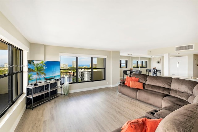 3200 N Port Royale Dr N Unit 1612, Fort Lauderdale, FL 33308 - living room featuring light wood-type flooring and baseboards