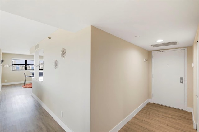 3200 N Port Royale Dr N Unit 1612, Fort Lauderdale, FL 33308 - hallway with light wood finished floors and baseboards