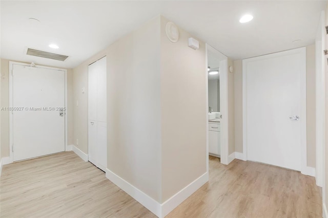 3200 N Port Royale Dr N Unit 1612, Fort Lauderdale, FL 33308 - hallway with light wood-style floors and recessed lighting