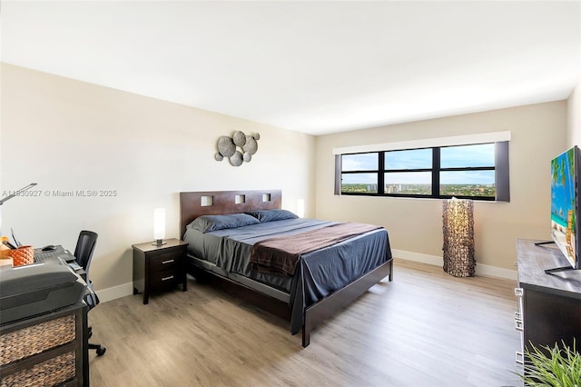 3200 N Port Royale Dr N Unit 1612, Fort Lauderdale, FL 33308 - bedroom with light wood-style flooring and baseboards