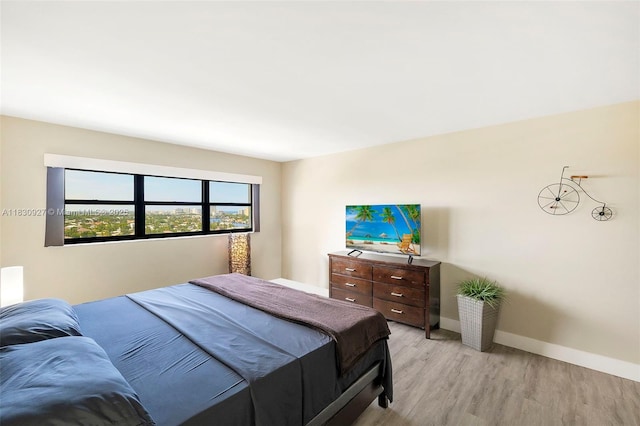 3200 N Port Royale Dr N Unit 1612, Fort Lauderdale, FL 33308 - bedroom with light wood-style flooring and baseboards