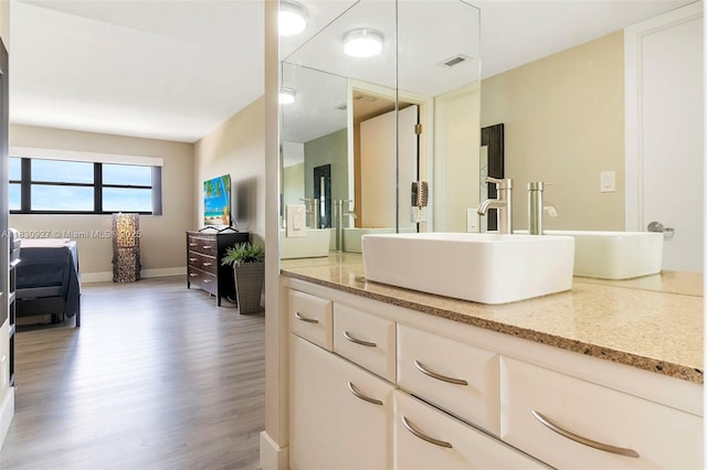 3200 N Port Royale Dr N Unit 1612, Fort Lauderdale, FL 33308 - bathroom featuring vanity and wood finished floors