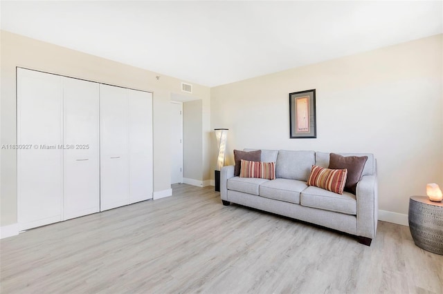 3200 N Port Royale Dr N Unit 1612, Fort Lauderdale, FL 33308 - living area with wood finished floors and baseboards