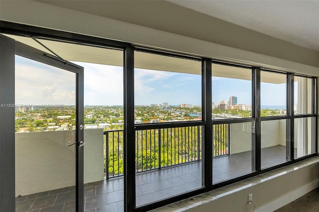 3200 N Port Royale Dr N Unit 1612, Fort Lauderdale, FL 33308 - unfurnished sunroom with a view of city and healthy amount of natural light