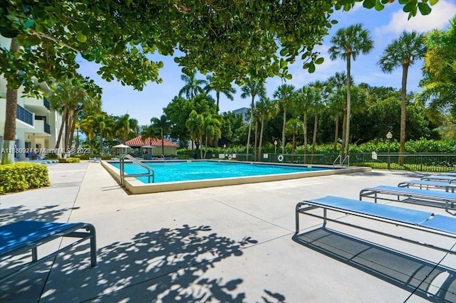 3200 N Port Royale Dr N Unit 1612, Fort Lauderdale, FL 33308 - community pool with a patio and view of wooded area