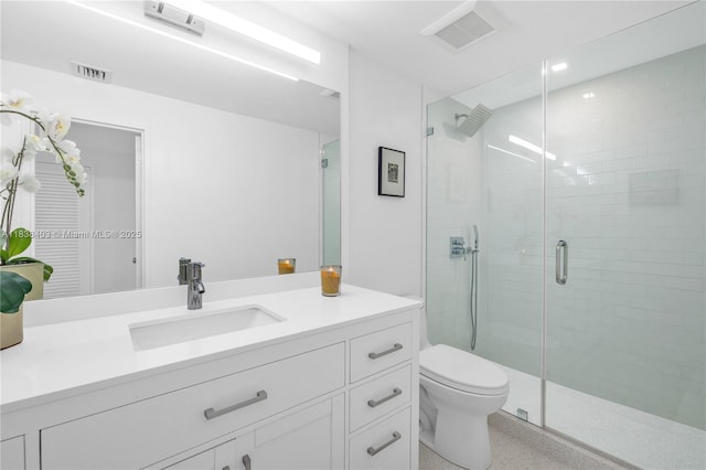 3 Island Ave Unit 12E, Miami Beach, FL 33139 - full bathroom featuring vanity, a shower stall, and speckle patterned floor