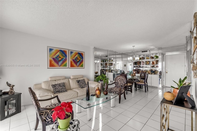 4001 Hillcrest Dr Unit 812, Hollywood, FL 33021 - living room featuring a textured ceiling, tile patterned floors, and a chandelier