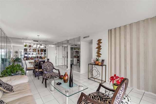 4001 Hillcrest Dr Unit 812, Hollywood, FL 33021 - living area with a chandelier, a textured ceiling, and tile patterned floors