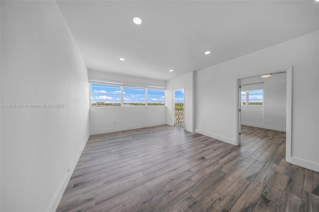 13155 Ixora Ct Unit 1105, North Miami, FL 33181 - empty room with wood finished floors and recessed lighting