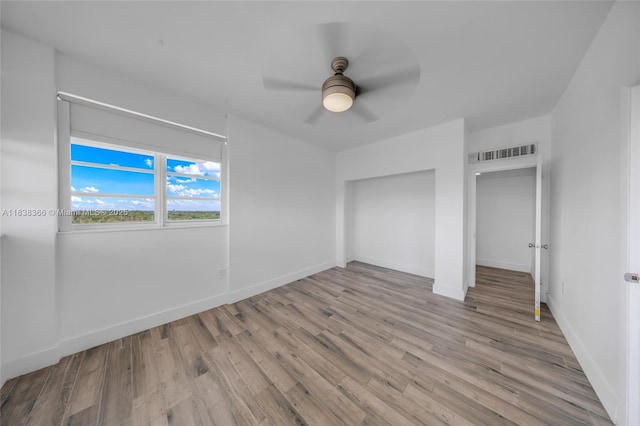 13155 Ixora Ct Unit 1105, North Miami, FL 33181 - unfurnished bedroom with wood finished floors and ceiling fan