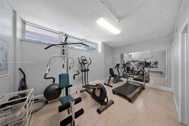 13155 Ixora Ct Unit 1105, North Miami, FL 33181 - exercise room with baseboards and a textured ceiling