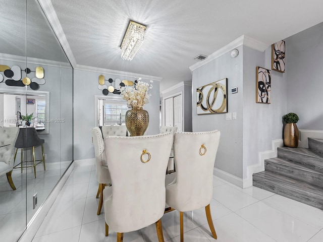 10942 W Sample Rd Unit E1, Coral Springs, FL 33065 - dining area with ornamental molding, light tile patterned floors, and a textured ceiling