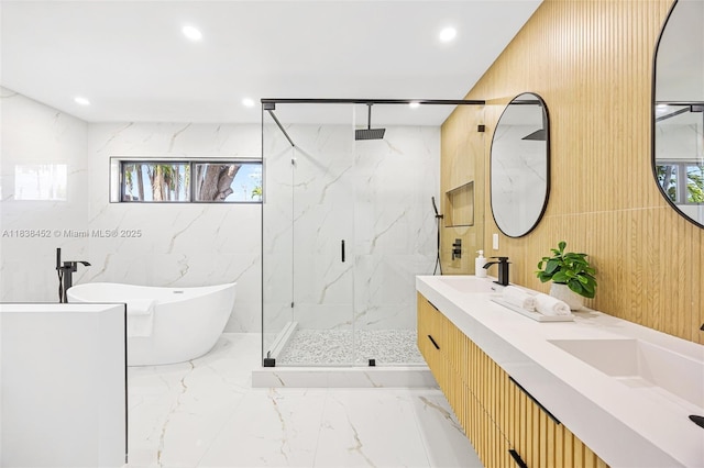 220 SW 75th Ter, Plantation, FL 33317 - bathroom featuring marble tiled flooring, a marble finish shower, a freestanding tub, double vanity, and recessed lighting