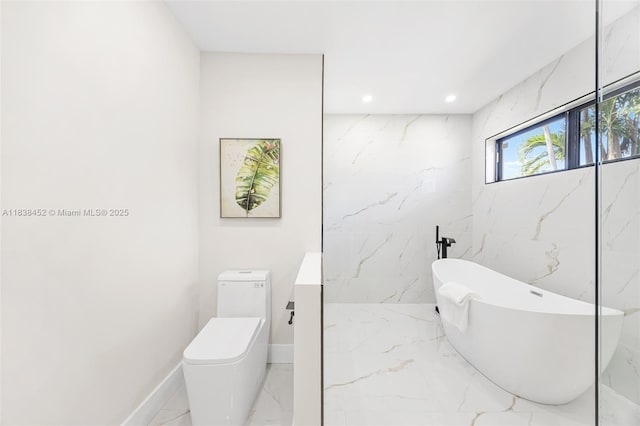220 SW 75th Ter, Plantation, FL 33317 - full bathroom with marble tiled floors, a freestanding tub, and recessed lighting