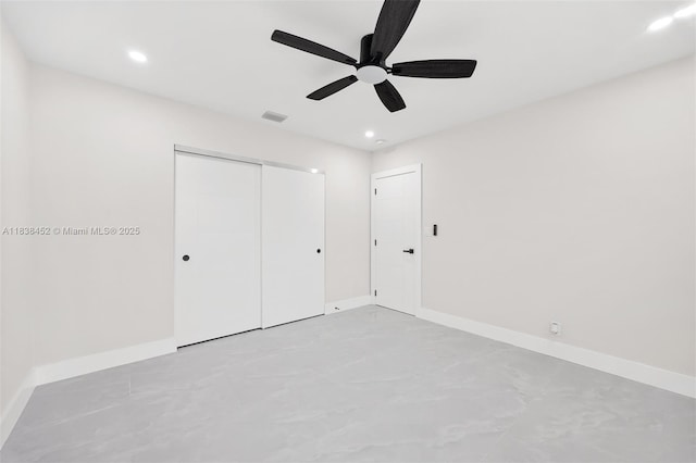220 SW 75th Ter, Plantation, FL 33317 - unfurnished bedroom featuring a closet, recessed lighting, a ceiling fan, and concrete floors