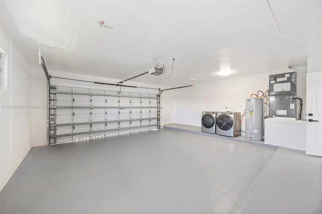 220 SW 75th Ter, Plantation, FL 33317 - garage with electric water heater, a garage door opener, washing machine and dryer, and heating unit