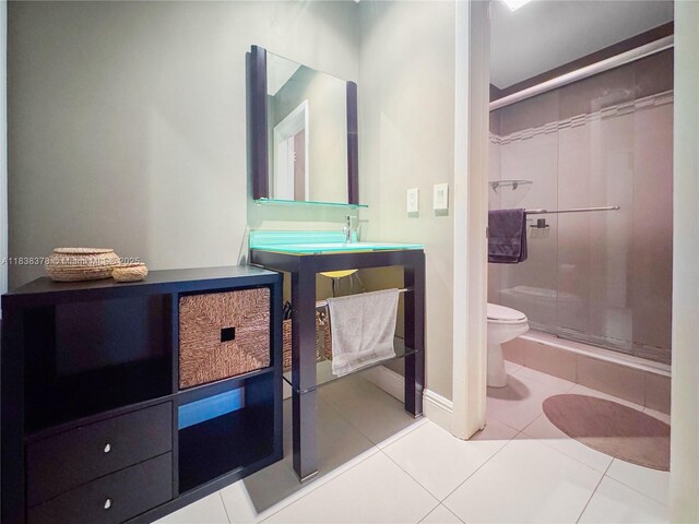 2880 S Carambola Cir S Unit 2071, Coconut Creek, FL 33066 - full bath featuring a shower stall, vanity, and tile patterned floors