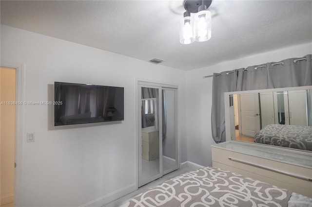 2841 NW 9th Ave, Wilton Manors, FL 33311 - bedroom featuring baseboards and a closet