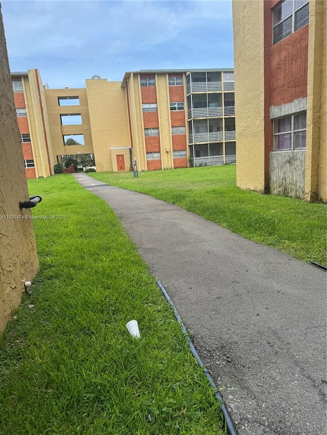 3610 NW 21st St Unit 413, Lauderdale Lakes, FL 33311 - surrounding community featuring a yard