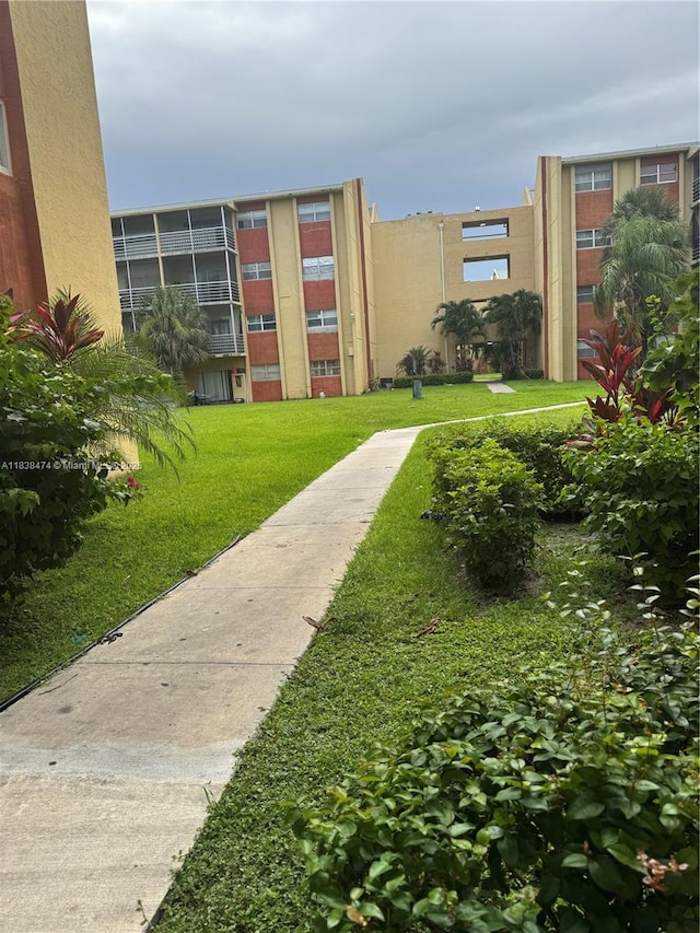 3610 NW 21st St Unit 413, Lauderdale Lakes, FL 33311 - surrounding community featuring a yard