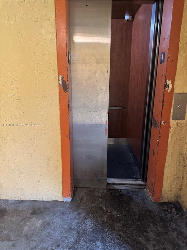 3610 NW 21st St Unit 413, Lauderdale Lakes, FL 33311 - detailed view of stucco siding