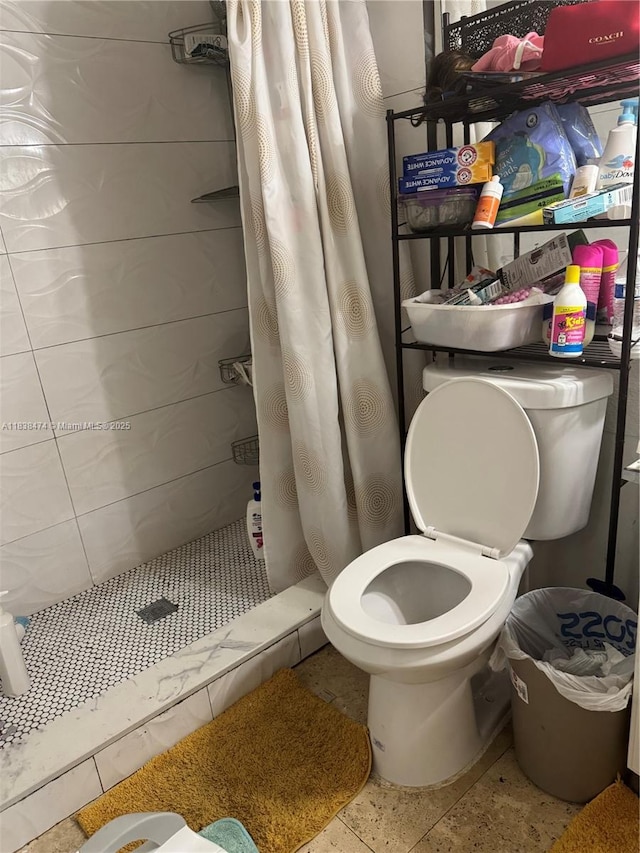 3610 NW 21st St Unit 413, Lauderdale Lakes, FL 33311 - bathroom with a shower stall and toilet