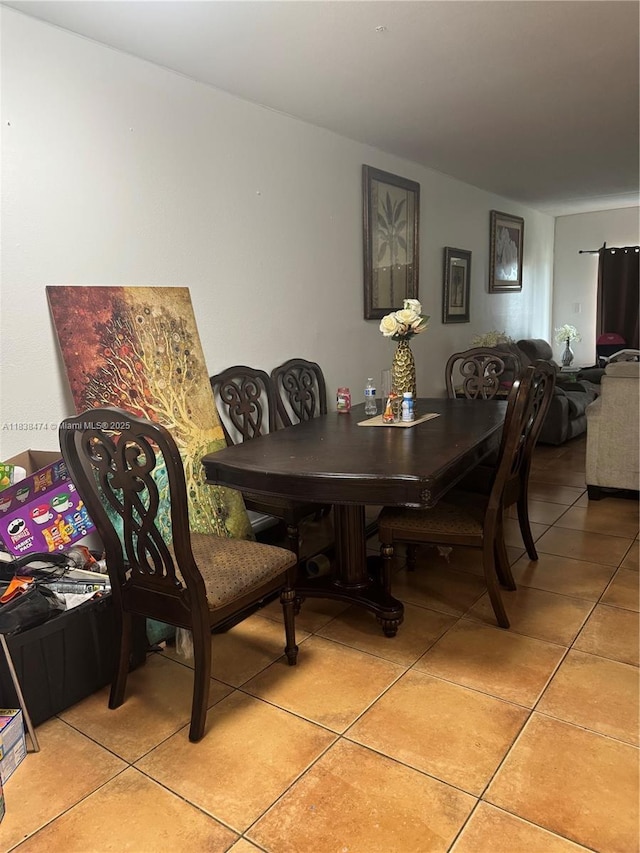 3610 NW 21st St Unit 413, Lauderdale Lakes, FL 33311 - dining space featuring light tile patterned floors