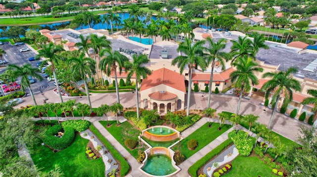 5938 Crystal Shores Dr Unit 103, Boynton Beach, FL 33437 - drone / aerial view of a pool and a nearby body of water