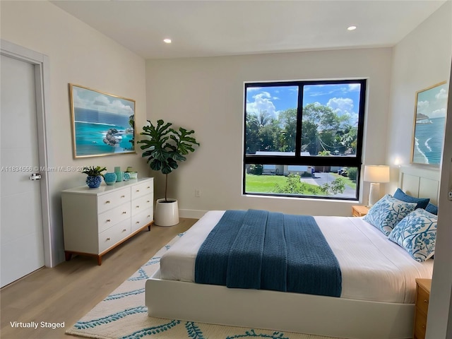 313 SW 10th St Unit A, Fort Lauderdale, FL 33315 - bedroom featuring light wood-style flooring and recessed lighting