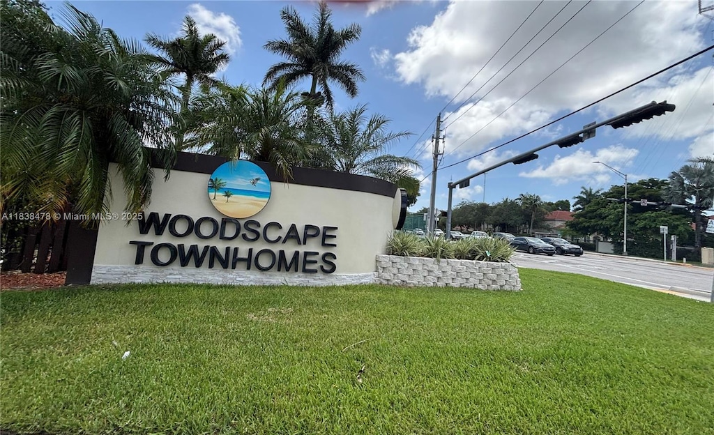 6992 Woodscape Cir Unit 6-T, Miramar, FL 33023 - community / neighborhood sign featuring a lawn