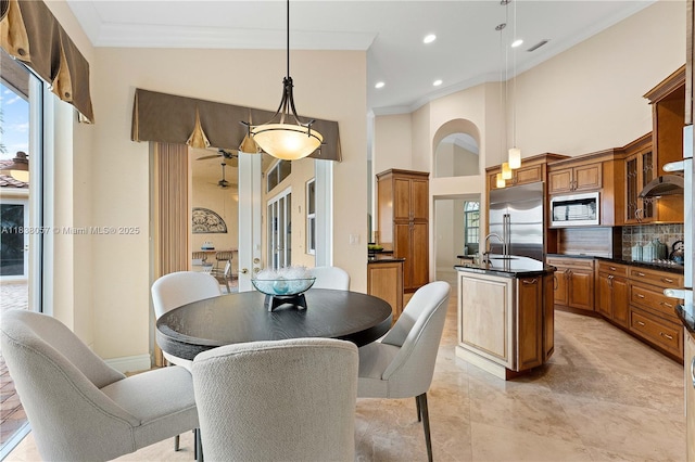 1504 NW 182nd Ave, Pembroke Pines, FL 33029 - dining room with crown molding, a high ceiling, recessed lighting, a ceiling fan, and light tile patterned floors