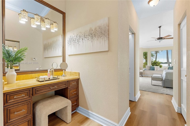 1504 NW 182nd Ave, Pembroke Pines, FL 33029 - ensuite bathroom featuring wood finished floors, a ceiling fan, vanity, and ornamental molding