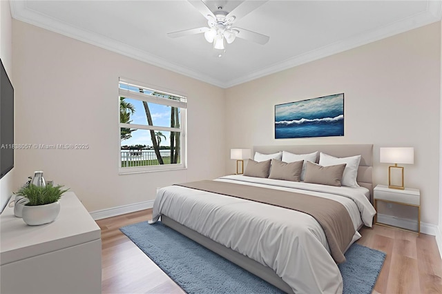 1504 NW 182nd Ave, Pembroke Pines, FL 33029 - bedroom with ornamental molding, light wood-style flooring, and a ceiling fan