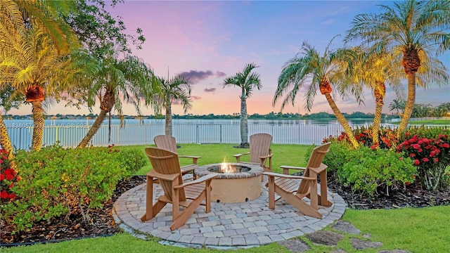 1504 NW 182nd Ave, Pembroke Pines, FL 33029 - view of patio with an outdoor fire pit and a water view