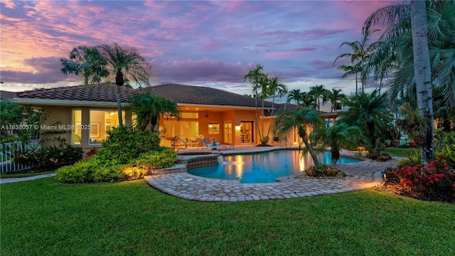 1504 NW 182nd Ave, Pembroke Pines, FL 33029 - view of swimming pool with a yard, a patio area, and a pool with connected hot tub