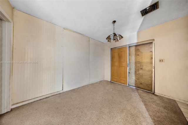 3300 NW 211th St, Miami Gardens, FL 33056 - unfurnished room featuring a chandelier and speckle patterned floor