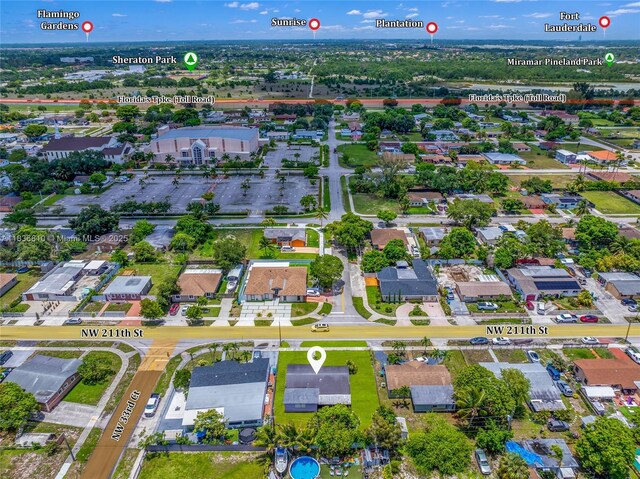 3300 NW 211th St, Miami Gardens, FL 33056 - aerial overview of property's location with nearby suburban area