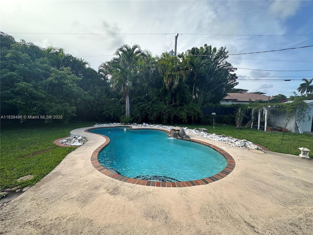 8751 SW 110th St, Miami, FL 33176 - swimming pool featuring a yard and a patio area