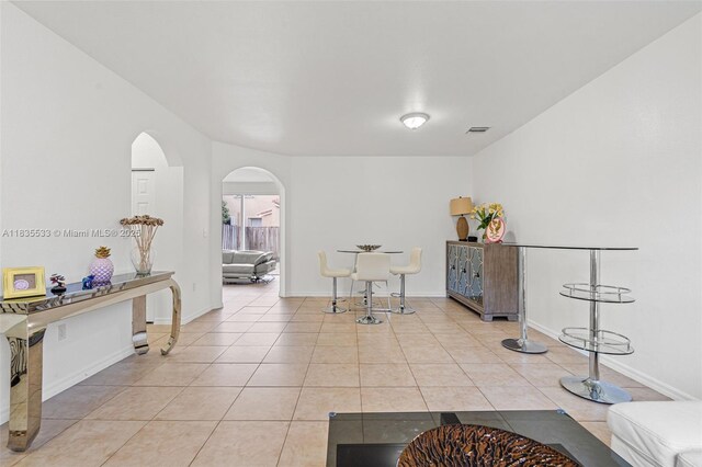 771 SE 2nd St, Homestead, FL 33030 - interior space featuring light tile patterned floors and arched walkways