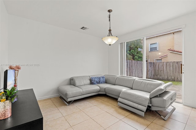 771 SE 2nd St, Homestead, FL 33030 - living room with light tile patterned floors and baseboards