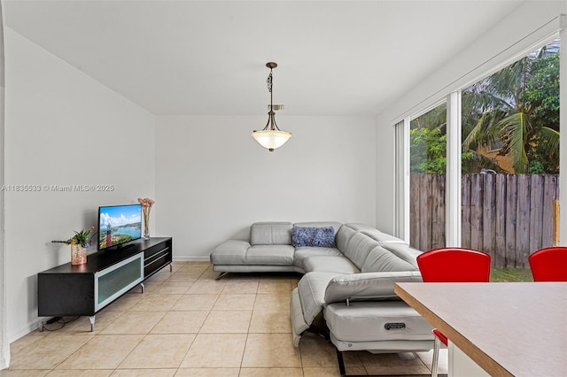 771 SE 2nd St, Homestead, FL 33030 - living area with plenty of natural light and light tile patterned floors
