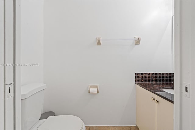 771 SE 2nd St, Homestead, FL 33030 - half bath with vanity, tasteful backsplash, and tile patterned floors