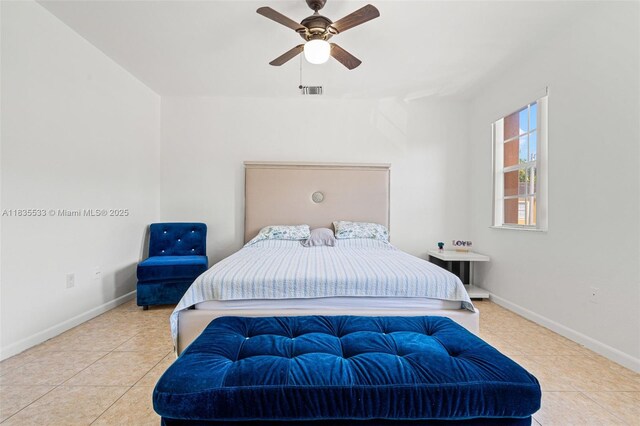771 SE 2nd St, Homestead, FL 33030 - tiled bedroom featuring baseboards and a ceiling fan