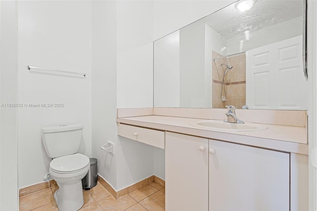 771 SE 2nd St, Homestead, FL 33030 - full bathroom featuring a tile shower, vanity, and tile patterned floors
