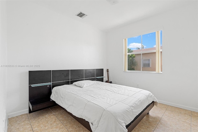 771 SE 2nd St, Homestead, FL 33030 - tiled bedroom with baseboards