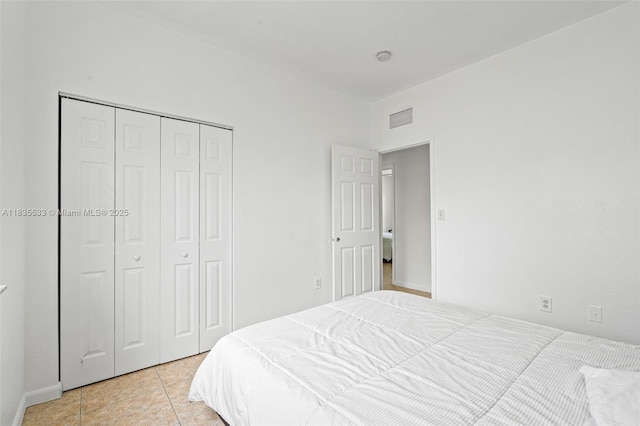 771 SE 2nd St, Homestead, FL 33030 - bedroom featuring a closet and light tile patterned floors